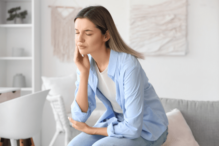 woman with tooth pain